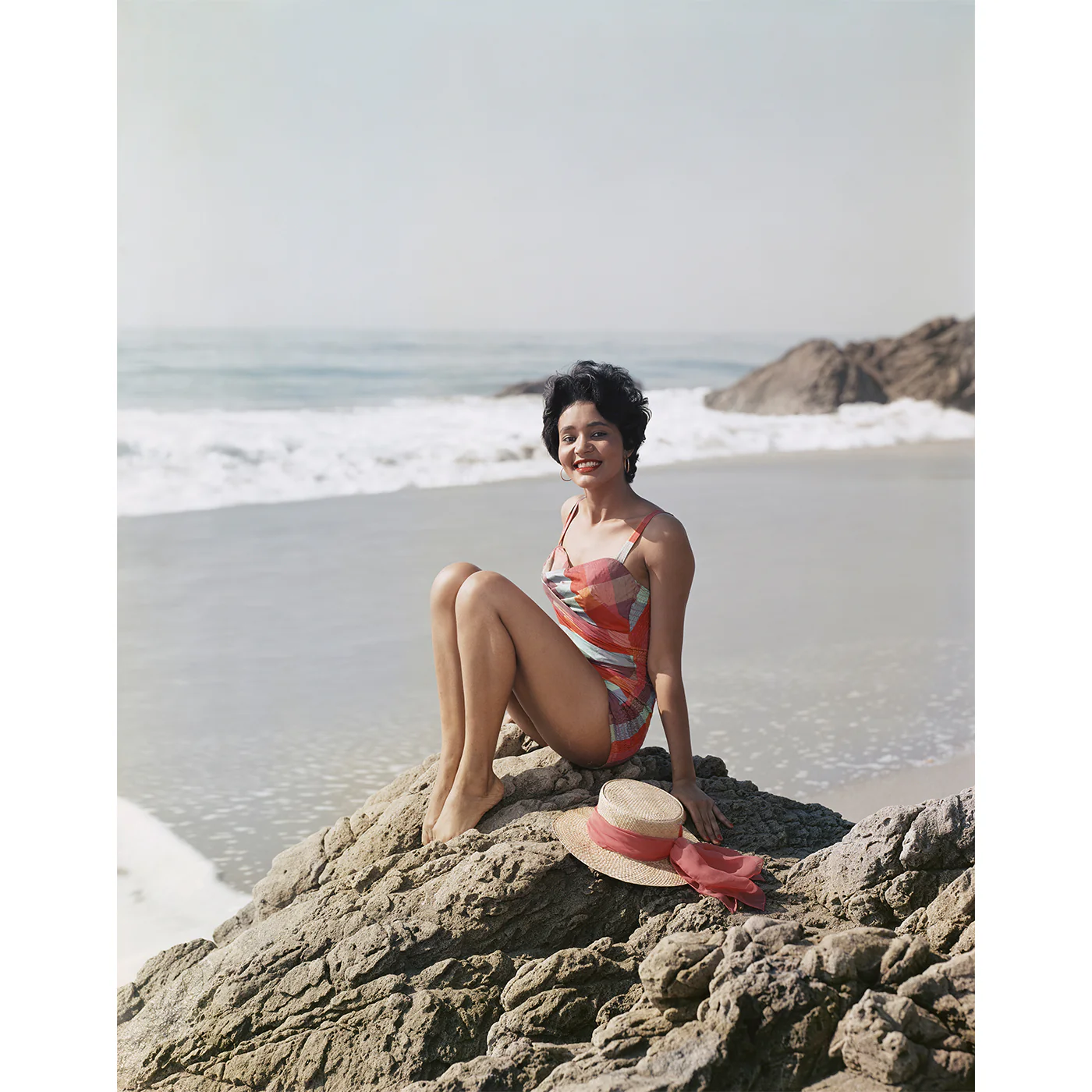 "Young Woman Sitting Beside the Sea" from Getty Images - Image 2